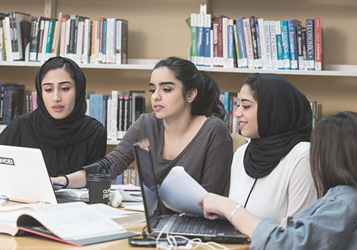 Merit based Graduate scholarship – Group of female students studying together