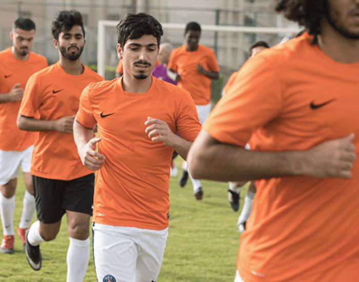 sports-wellness-1 طلاب جامعة أبوظبي في ملعب كرة القدم
