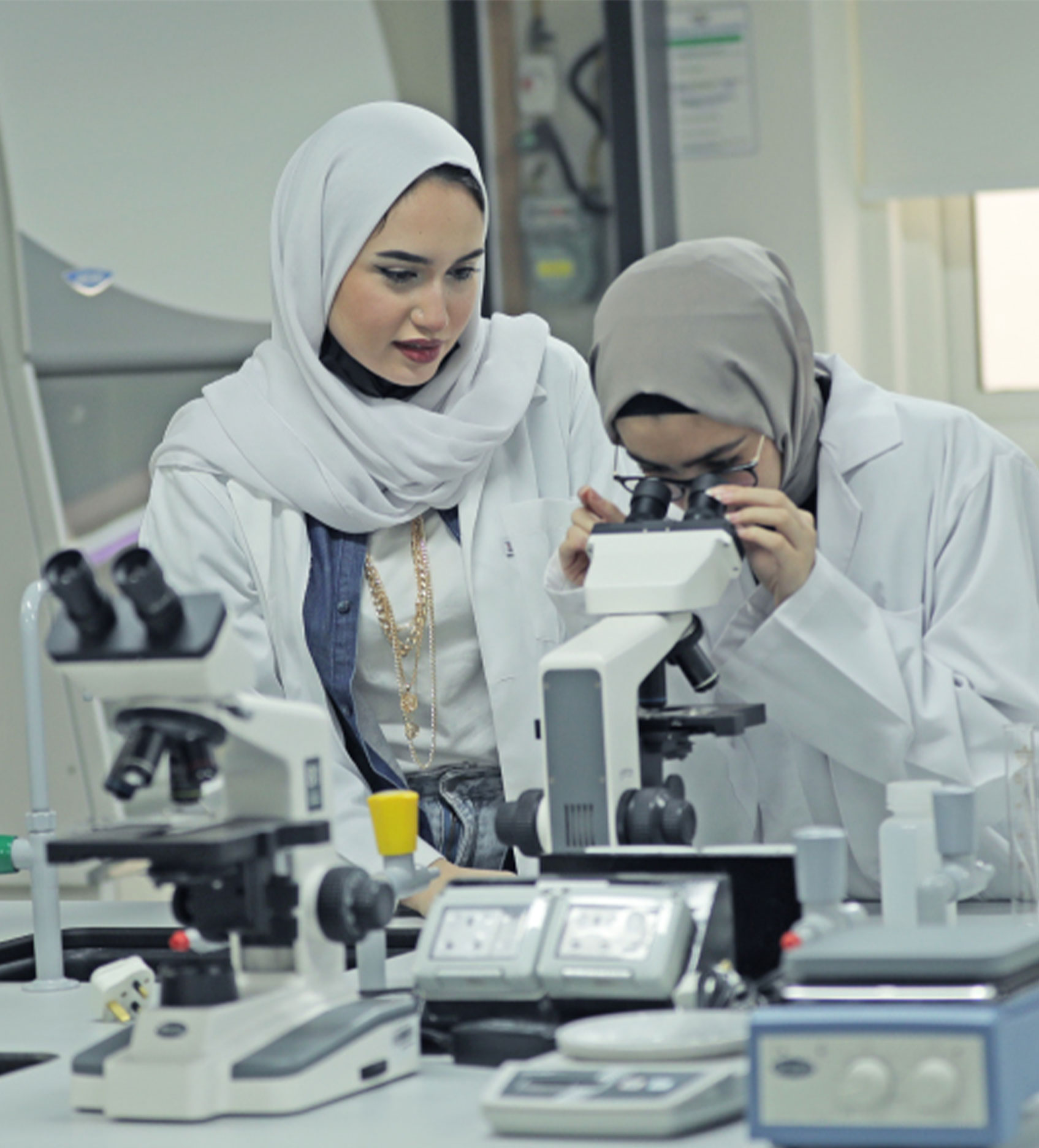 Student submitting a research paper at the helpdesk